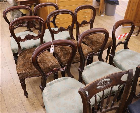 A set of five Victorian mahogany balloon back dining chairs and three similar chairs
